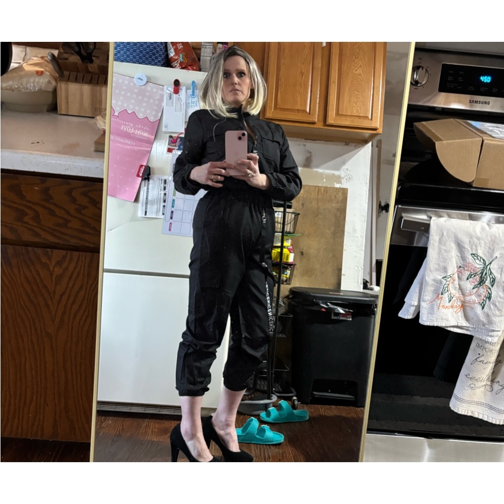 Elegant Black Satin Jumpsuit with Long Sleeves